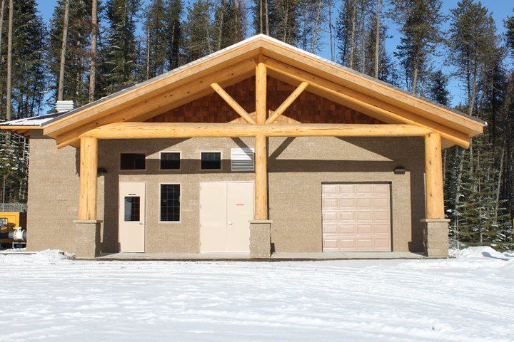 Commercial pole building with timber entry