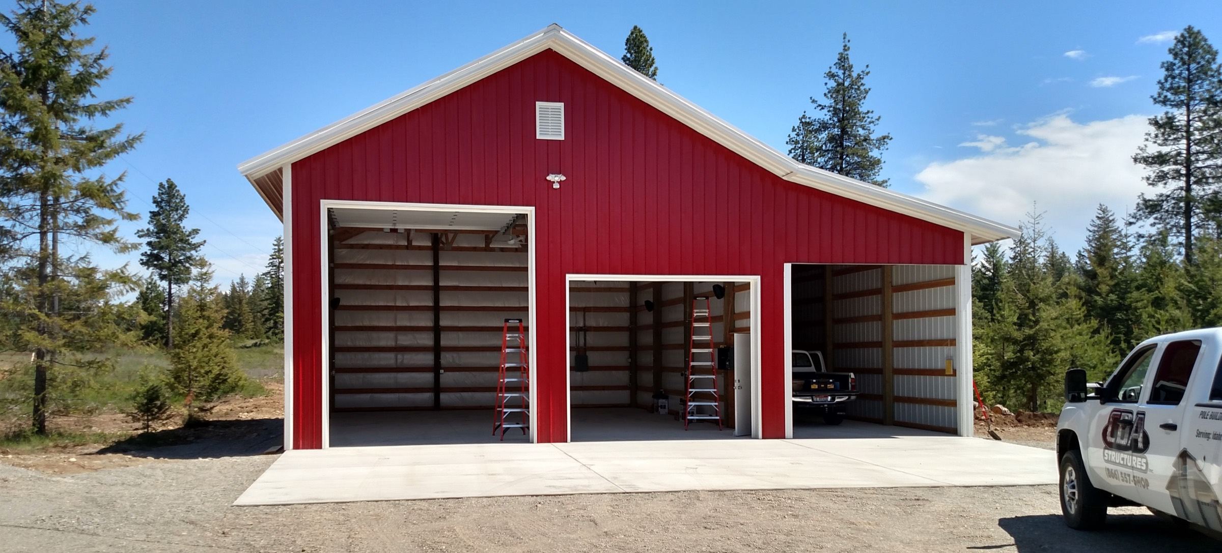 Custom three-bay steel shop under construction