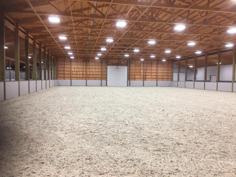 Post-frame riding arena in Hauser, Idaho
